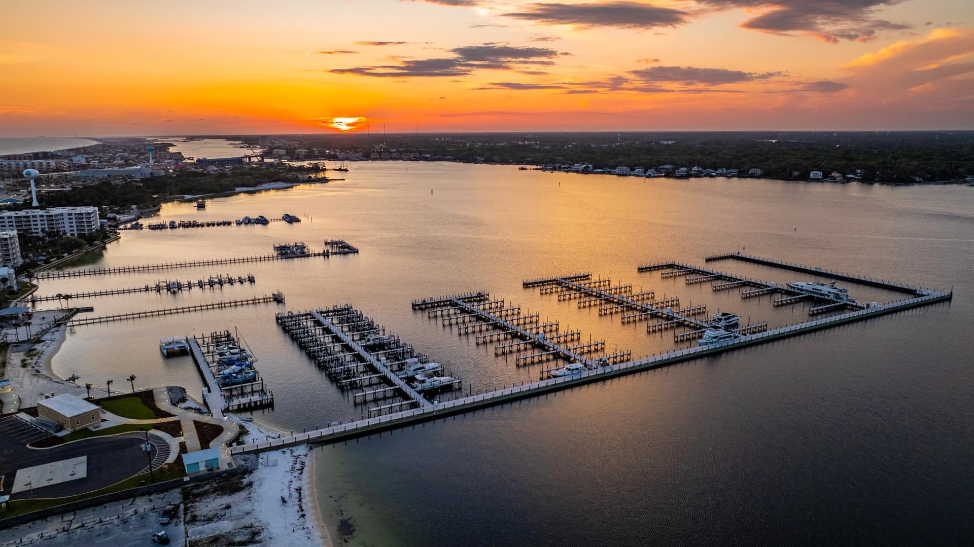 Sunset Isle Yacht Club marina at sunset in Fort Walton Beach, Florida