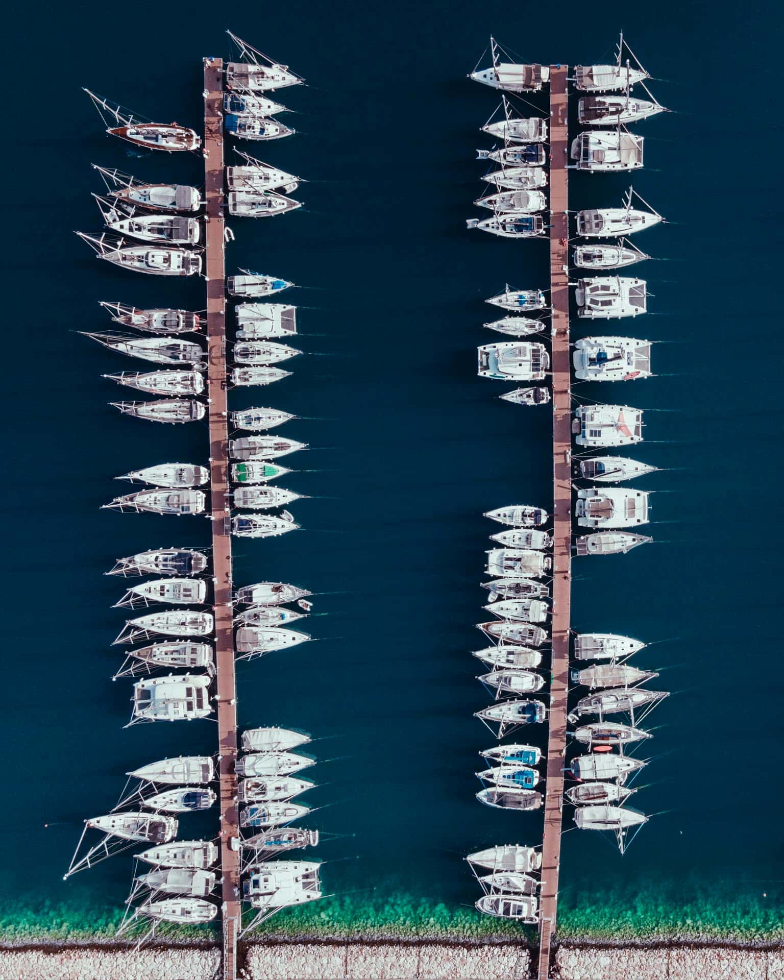 Aerial view of marina slips representing the Atlantis Control Systems team